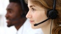 Call center operator.Young beautiful brunette woman in headset. Business concept Royalty Free Stock Photo