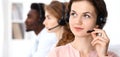 Call center operator.Young beautiful brunette woman in headset. Business concept Royalty Free Stock Photo