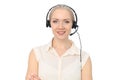 Call center operator or young beautiful business woman in headset isolated over white background Royalty Free Stock Photo