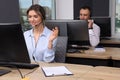 Call center operators with headsets working in modern office Royalty Free Stock Photo