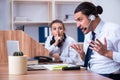 Call center operators working in the office Royalty Free Stock Photo