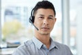 Call center, serious and portrait of man in office for customer service, communication and support. Consultant, crm and Royalty Free Stock Photo