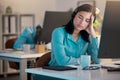 Call center, sleeping and tired woman in office for customer service or support at night. Telemarketing, sleep and Royalty Free Stock Photo