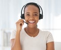 Call center, telemarketing and black woman in customer service office with headset, smile and happiness. Face of female