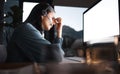 Call center, woman and headache on computer in night, overtime and stress, burnout and desktop glitch, pain and crisis Royalty Free Stock Photo