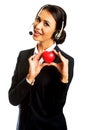 Call center woman holding heart model Royalty Free Stock Photo