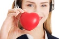 Call center woman holding heart Royalty Free Stock Photo