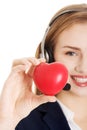 Call center woman holding heart Royalty Free Stock Photo