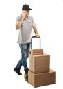 During a call - Courier hand truck boxes and packages Royalty Free Stock Photo