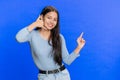 Call me, here is contact number, woman girl doing phone gesture, asking for conversation, hotline Royalty Free Stock Photo