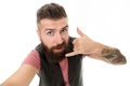 Call me later. Bearded man shows call me gesture. Hipster with long beard symbol conversation. Mobile call. Mobile Royalty Free Stock Photo