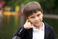 Call Me, Little Boy making a call me gesture Royalty Free Stock Photo