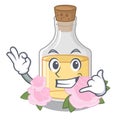 Call me rose oil poured in cartoon bottle Royalty Free Stock Photo