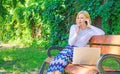 Call sales techniques. Sales manager works in park. Woman with laptop works outdoors. Best sales managers always possess Royalty Free Stock Photo