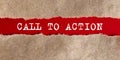 CALL TO ACTION text appearing behind on torn paper Royalty Free Stock Photo