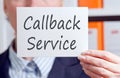 Callback Service - Businesswoman with sign in the office Royalty Free Stock Photo