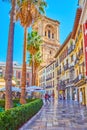 Calle Capuchinas street and bell tower of Granada Cathedral, Spain Royalty Free Stock Photo