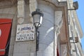 Calle de La Montera Sign and Royal Lamp Head in the streets of Madrid, Spain