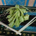 This is called a ketupat where food is often made during the month of Ramadan and holidays