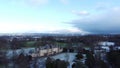 Aerial: Snowy park and lonely manor in Scotland