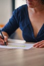 woman doing lettering