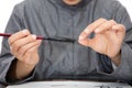 Calligraphers are arranging the brush head