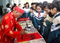 Calligraphers writing art letters for visitors