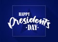 Calligraphic handwritten lettering composition of Happy Presidents Day with stars on blue background.