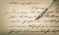 Calligraphic handwritten text and vintage ink pen Royalty Free Stock Photo