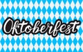 Calligraphy lettering Oktoberfest written with brush on white blue background Octoberfest geometric seamless pattern. Traditional Royalty Free Stock Photo