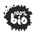 Calligraphy One Hundred Percent Bio Label on a Black Inkblot