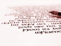 Calligraphy pen and handwriting on paper Royalty Free Stock Photo