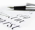 Calligraphy pen, letters Royalty Free Stock Photo
