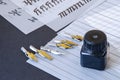 Calligraphy pen tips , flat tipped nib, ink and practice sheets on the table Royalty Free Stock Photo