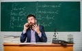 Calling parents. Call colleague ask advice. Teacher bearded man talk mobile phone. Pedagogue keep in touch with Royalty Free Stock Photo