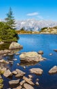 Calm autumn Alps mountain lake with clear transparent water and reflections. Spiegelsee or Mirror Lake, Reiteralm, Steiermark, Royalty Free Stock Photo