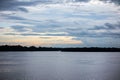 Panoramic View of Calm Bay Waters Under Scattered Clouds at Twilight Royalty Free Stock Photo