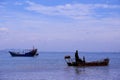 The Calm beach and stranded fish boats