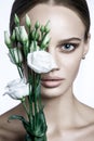 Calm Beauty Fashion Model Woman face. Portrait with white Rose flower.