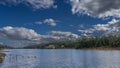 A calm blue lake. Ripples on the water. Royalty Free Stock Photo