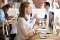 Calm businesswoman doing yoga exercise at workplace Royalty Free Stock Photo