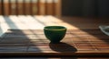 Single Green Tea Cup on Bamboo Mat Royalty Free Stock Photo
