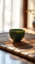 Single Green Tea Cup on Bamboo Mat Royalty Free Stock Photo