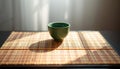 Single Green Tea Cup on Bamboo Mat Royalty Free Stock Photo