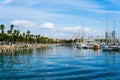 Calm coast in the Port Vell harbor and moored boats in Barcelona, Spain Royalty Free Stock Photo