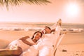 Calm couple napping in a hammock