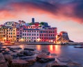 Calm dawn cityscape of Vernazza port. Exciting summer sunrise on Liguria, Cinque Terre, Italy, Europe. Dramatic seascape of Medite Royalty Free Stock Photo