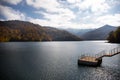 A calm evening landscape with lake and mountains. Amazing view of the Goy-Gol (Blue Lake) Lake among colorful fall forest at Ganja