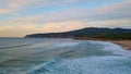 Calm evening marine landscape beautiful sandy beach with mountain aerial view. Royalty Free Stock Photo