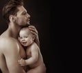 Calm father carrying his beloved, cute son Royalty Free Stock Photo